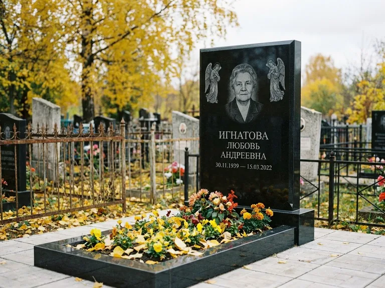Памятник с гравировкой ангела — гравировка двух ангелов по сторонам портрета, работа «Игнатова» в Ульяновске
