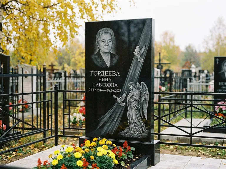 Памятник с гравировкой ангела — гравировка ангела с голубем по диагонали стелы, работа «Гордеева» в Ульяновске